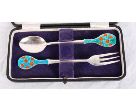 A silver plated christening spoon and fork with enamelled handles, in fitted case, by Payne & Son Ltd Oxford