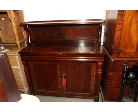 An early 19th Century rosewood chiffonier, back fitted shelf on "S" supports, base fitted two frieze drawers and cupboard, 51