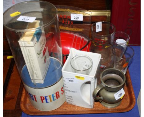 A Watneys Red Barrel bar top advertising light, a Peter Stuyvesant cigarette advertising model and other advertising material