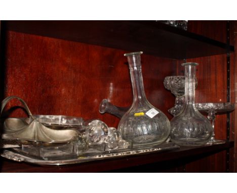 A silver plated two-handled tray, a glass trinket tray and three glass decanters, etc