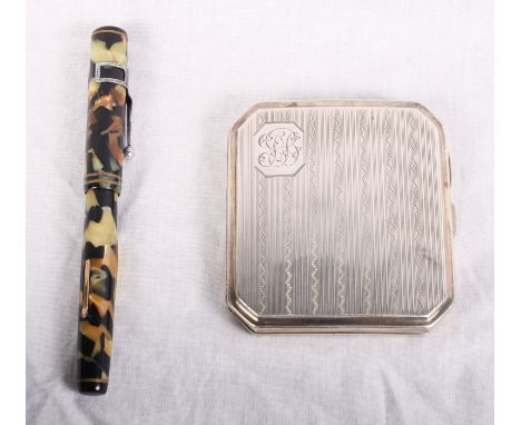 A silver cigarette case with engine turned decoration, a silver bracelet and a fountain pen with marbled case