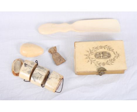 A 19th Century French prayer book with ivory bindings, a carved ivory shoe horn, an ivory three-section inro and a plain ivor
