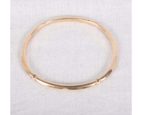 A 9ct gold bangle, 30.9g
