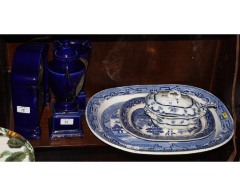 A 19th Century blue and white Willow pattern meat dish, 18" long, a similar Ridgways dish, 12" long, a blue transfer decorate