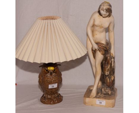 A parquetry decorated money box, three other wooden boxes, an owl table lamp, a plaster statue of a nude lady and three late 