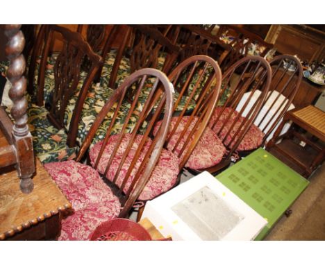 A set of Ercol stick back dining chairs 