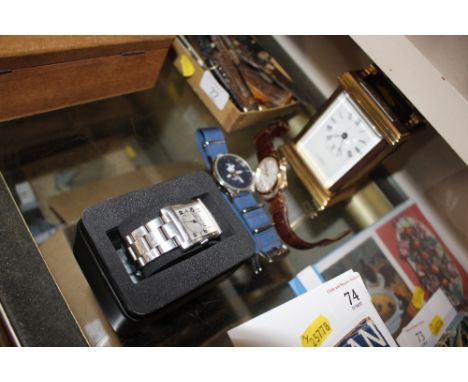 A Croydon's brass carriage clock and three other watches