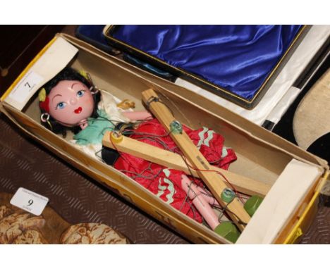 A Pelham standard puppet in box