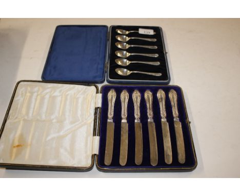 A quantity of various silver teaspoons, condiment spoons, sugar tongs, Continental white metal and enamel decorated pickle fo
