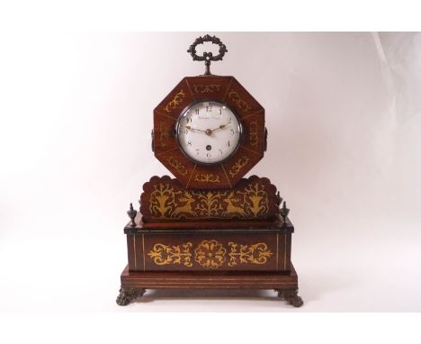 A Regency mahogany and brass inlaid mantel clock, the painted enamel dial inscribed 'Tempus Fugit' with single winding hole, 