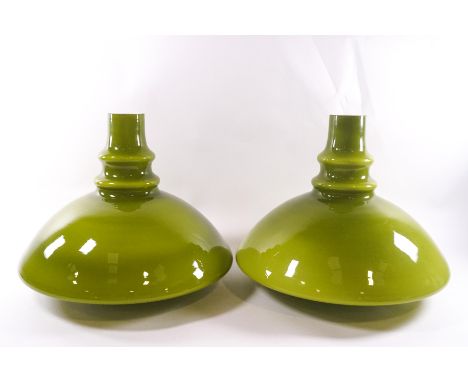 A pair of 1970's green glass ceiling shades, 30cm high