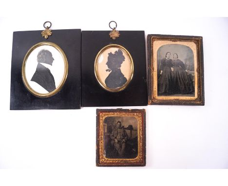 A 19th century portrait silhouette of a Gentleman with gilt highlights, circa 1830, a further silhouette of a Lady and two fr
