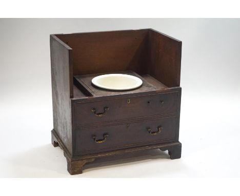 A George III mahogany chest commode with ceramic pan, 75cm high x 68.5cm wide x 45cm deep