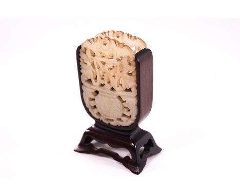 A Chinese mutton fat jade double panel, pierced and carved as vases of flowers, on a wood stand, 11cm high (including stand)