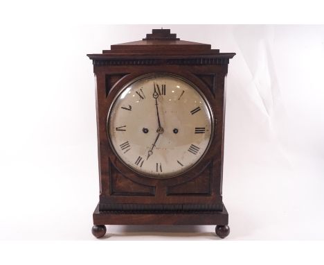 A Regency mahogany bracket clock, the eight day movement striking on a bell, painted dial with Roman numerals and maker's nam