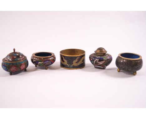 A collection of five Chinese cloisonne enamel items: three pots, one with cover, a pepperette and a napkin ring