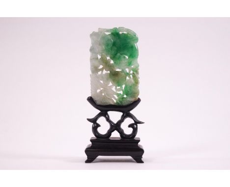 A Chinese jade panel, pierced and carved with a beast and a crane, 7cm x 4.5cm