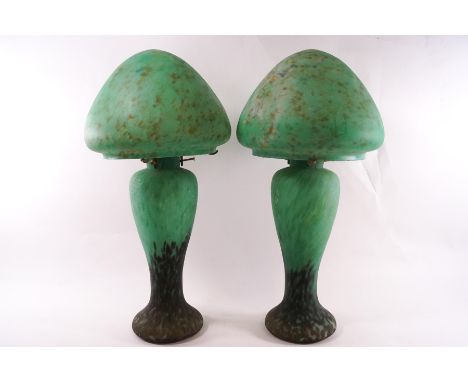 A pair of 1930's mottled green glass table lamps and shades of mushroom shape, 51cm high