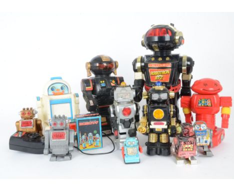 Collection of unboxed plastic Robots by various makers, including New Bright Robotron RT-2, Chines Talk a Tron with Talking M