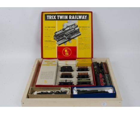 A Boxed Trix Twin Goods Set and other 1950's Trains, the TTR set with BR black locomotive 31829 with tender and five wagons, 