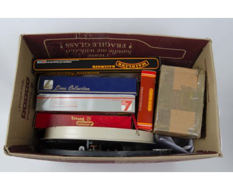 A Collection of OO Gauge Layout Accessories, including a bundle of flexitrack, two turntable units, large assortment of build