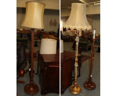 A gilt and fabric standard lamp, together with three further mahogany examples (4) 