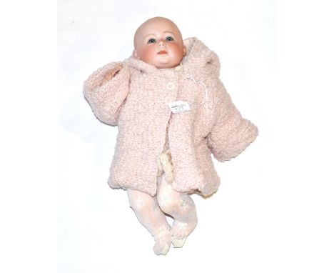 German Swaine &amp; Co Lori bisque socket head doll, with impressed and printed mark to the back of the head, fixed blue eyes