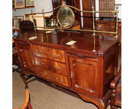 An early 20th century mahogany sideboard, gilt metal gallery back with central circular mirror, base with three central drawe