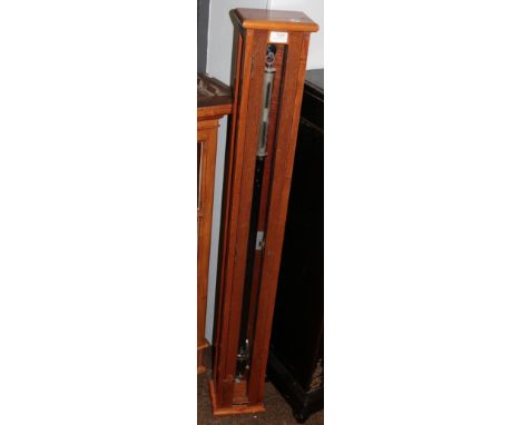 A barometer .  A mid 20th century mahogany cased Fortin stick barometer. Case 118 cms high. Barometer. 102 cms high. General 