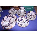 A Masons Imari design part dinner service