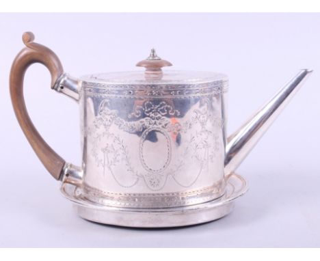 A Georgian silver bright cut oval teapot with composition handle and finial, marks RH London 1821, 14oz troy gross, and a She