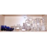 Two opaque twist stem candlesticks and two cut glass candlesticks, two pressed glass baskets and two