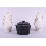 An early 19th century octagonal basaltware sugar box and cover with classical sprigged decoration, 5