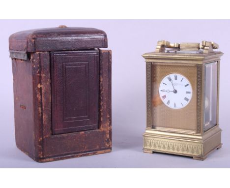 A late 19th century carriage clock with hour repeat and strike movement, white enamel dial, supplied by French Royal Exchange