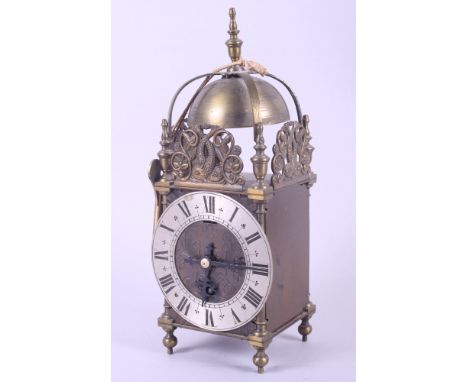 A well reproduced lantern clock, 12" high