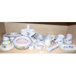 A Poole pottery floral decorated butter dish and cover, four egg cups, a basket, seven posy