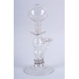 A lacemaker's Georgian glass oil lamp, 10 1/4" high