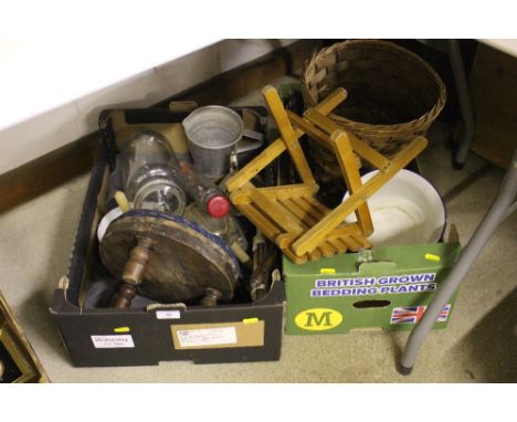 Two boxes containing a Victorian footstool; various kitchenalia; an enamel chamber pot etc. 