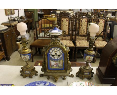 A late 19th Century Sevres style and gilt metal mounted clock garniture decorated with figures (the garniture's converted to 