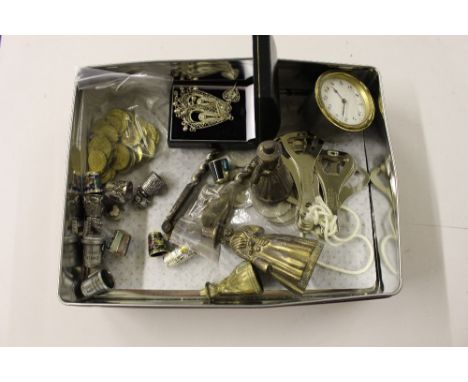 A tin of thimbles, a clock, brass bells in the form of Elizabethan style figures, etc.