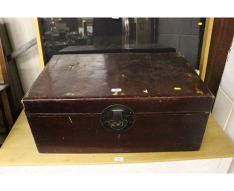 A Chinese leather covered trunk 