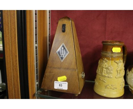 A wooden cased Metronome