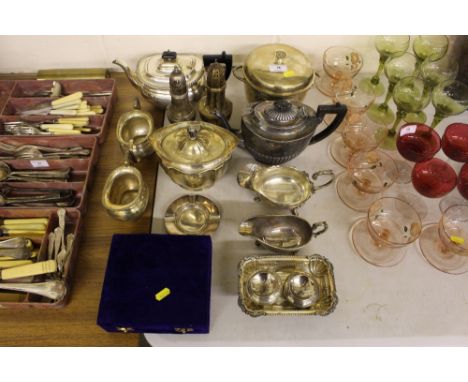 A quantity of various silver platedware to include a tea caddy, a half fluted teapot, sauce boats, a three piece teaset etc. 