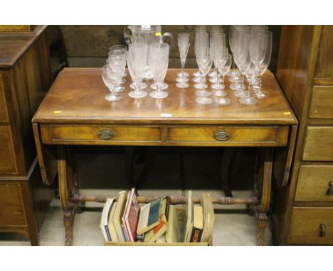 A Regency style mahogany drop leaf sofa table fitted two drawers 