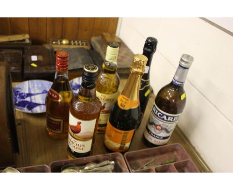 Two bottle of Famous Grouse Scotch Whiskey; together with Napoleon French brandy; and three various other bottles