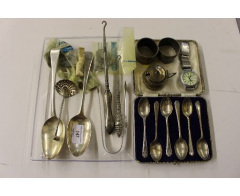 A tray of silver cutlery to include two 19th Century dessert spoons, a cased set of six coffee spoons, serviette rings; toget