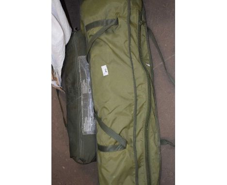 An army bed and mosquito net