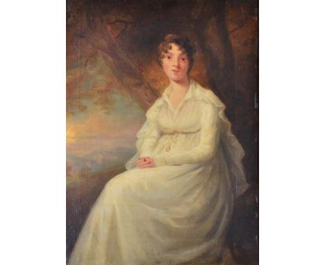 Follower of Henry Raeburn RA, PRSA (1756-1823) Portrait of an elegant lady in a white dress, seated before a tree Oil on canv