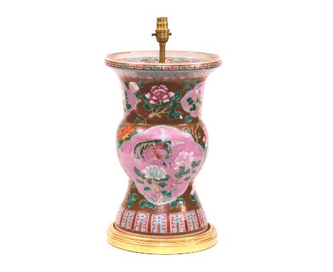 A Chinese pottery vase lamp, circa late 17th/early 18th century, decorated with pink and jade green glazed floral panels on b