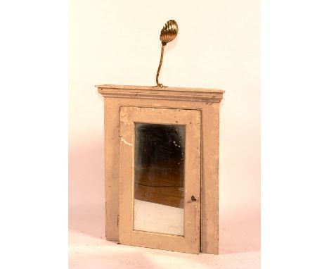 A painted corner cabinet, circa 19th century, with glazed door and brass adjustable lamp to top, 96cm high x 81cm wide
